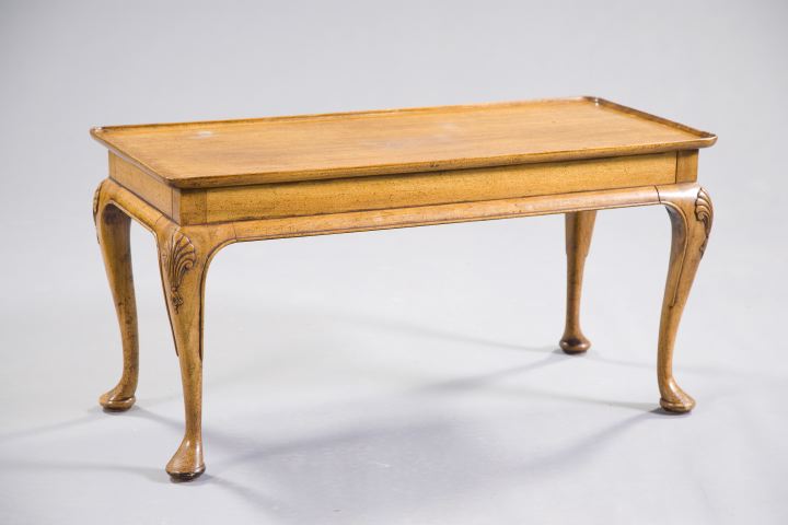 Appraisal: George II-Style Mahogany Cocktail Table the dished rectangular top above