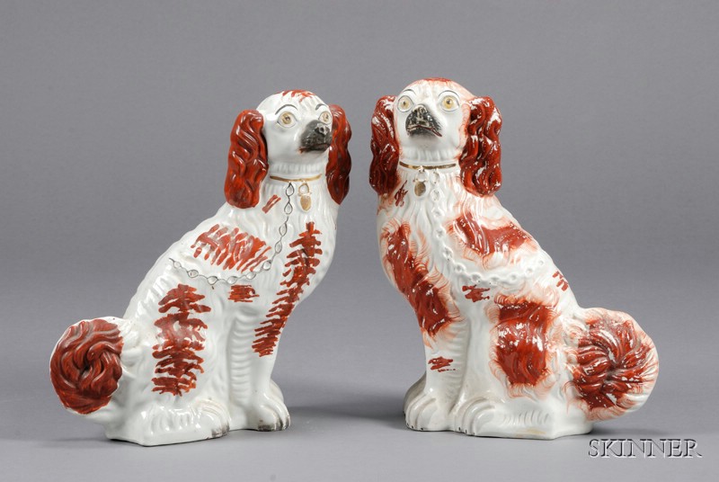 Appraisal: Two Staffordshire Earthenware Spaniels England th century each red enamel