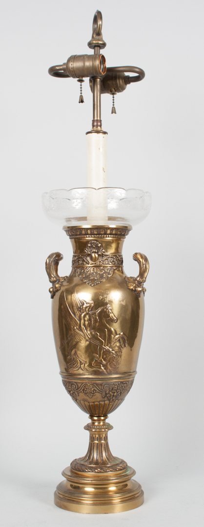 Appraisal: French Neoclassical style brass urn double-handled urn with relief decoration