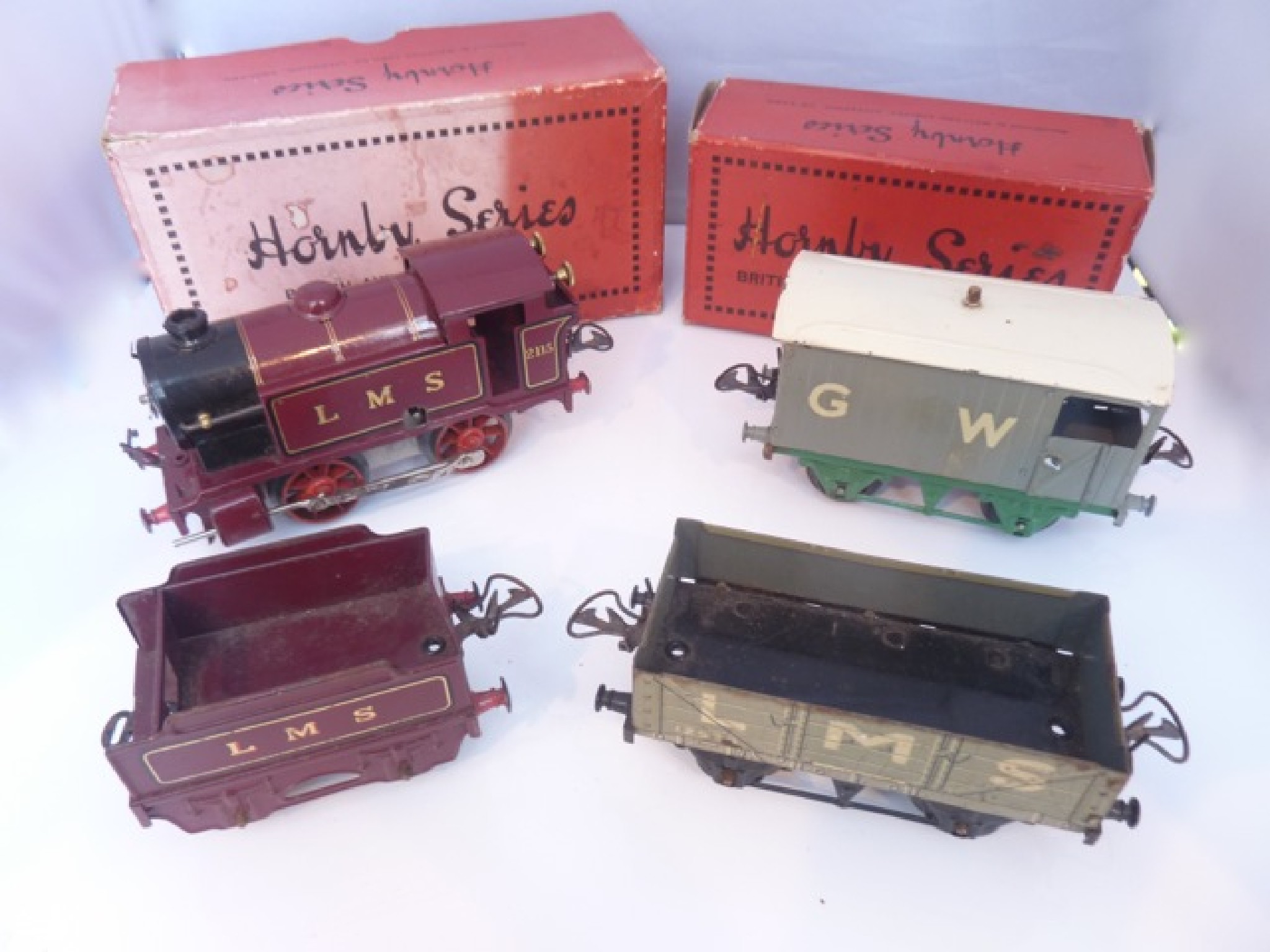 Appraisal: A collection of Hornby gauge tin plate railway items to