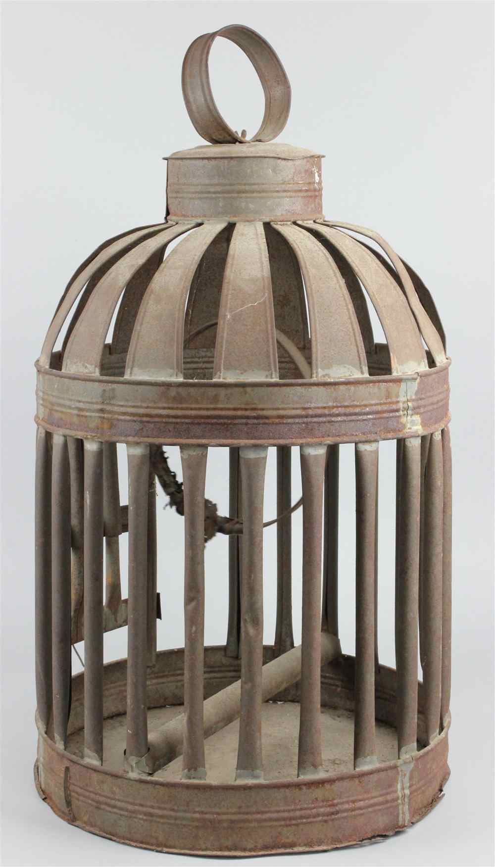 Appraisal: ANTIQUE TIN BIRD CAGE domed upper section with applied loop