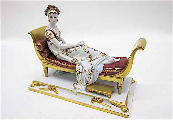 Appraisal: GERMAN PORCELAIN FIGURINE of Madame Recamier reclining on empire sofa