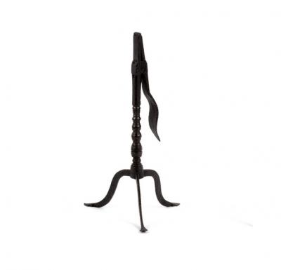 Appraisal: An th Century wrought iron rush-light holder with wavy sprung