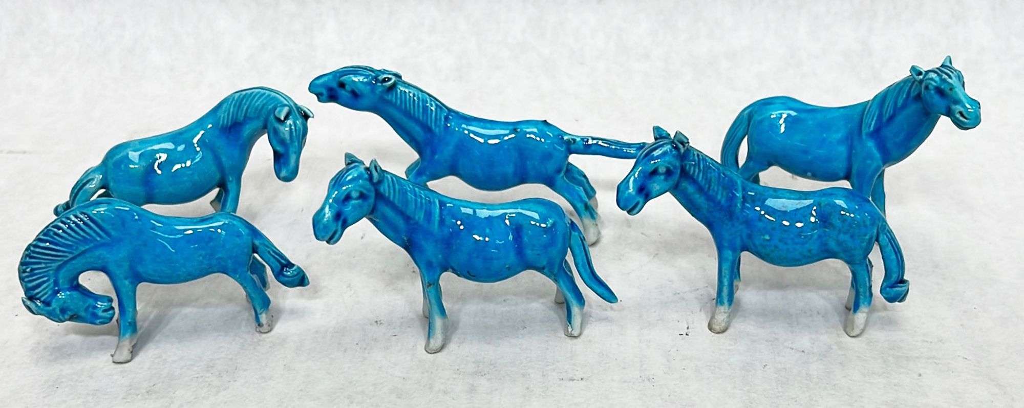 Appraisal: Chinese turquoise glazed porcelain horse modelsEarly thC Longest measures in