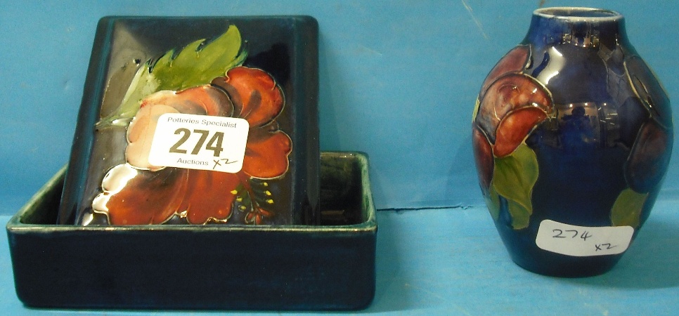 Appraisal: Moorcroft Box Cover in the Hibiscus design and Small Vase