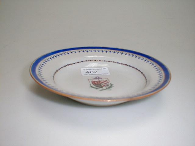 Appraisal: An thC Chinese porcelain armorial dish centrally painted with a