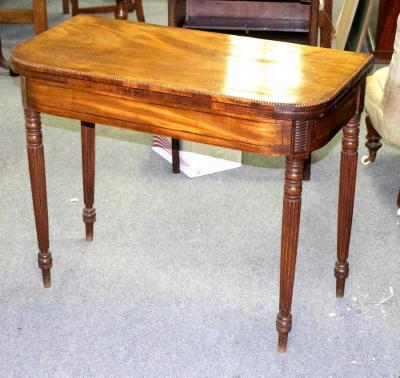 Appraisal: A Regency mahogany card table the fold over top on