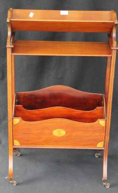 Appraisal: AN EDWARDIAN MAHOGANY CANTERBURY with book rack with two compartments