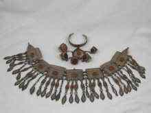 Appraisal: A Turkoman headdress and bracelet each inset with semi-precious stones