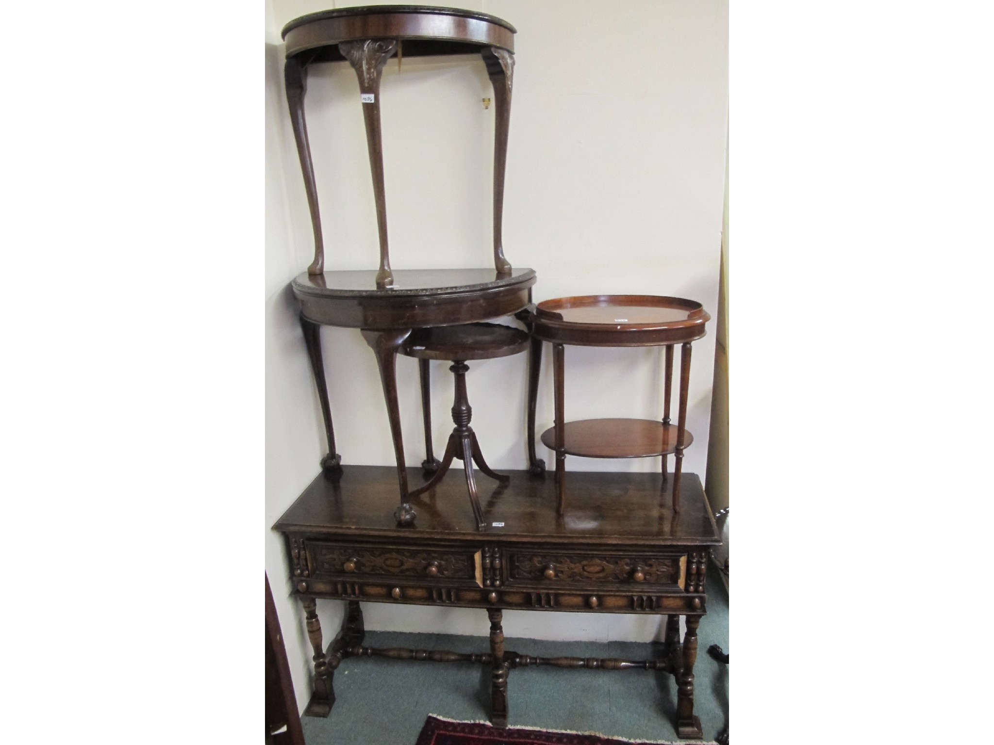 Appraisal: An oak buffet mahogany demi-lune fold over card table demi-lune