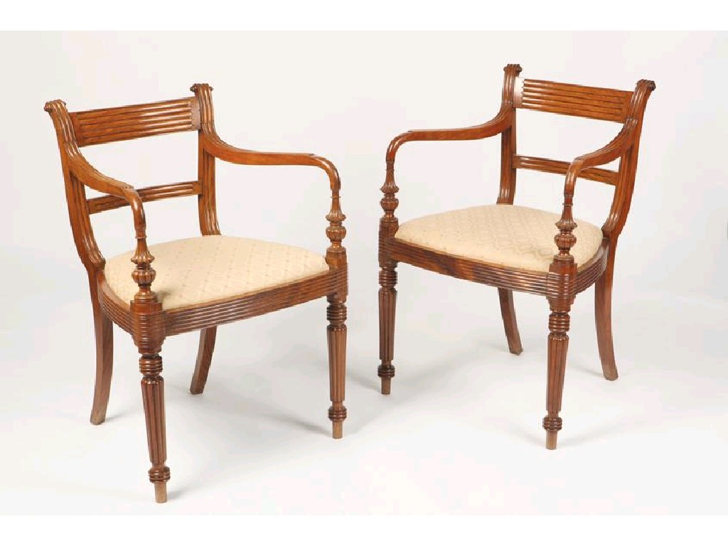 Appraisal: A PAIR OF COLONIAL GONZALES ALVES ELBOW CHAIRS with reeded