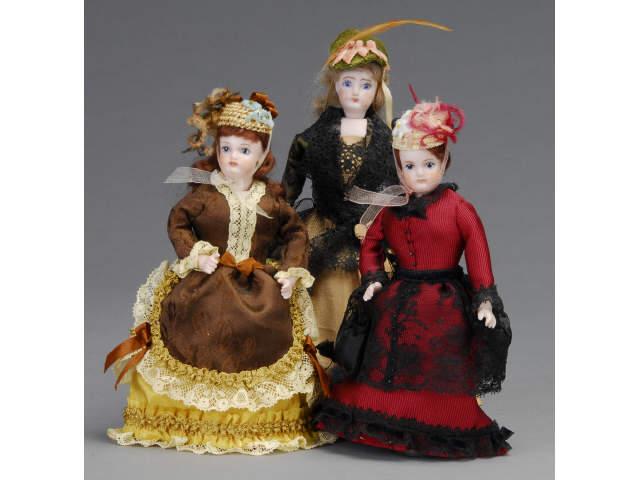 Appraisal: Trio of Reproduction Dollhouse Dolls MN Three contemporary dolls modeled