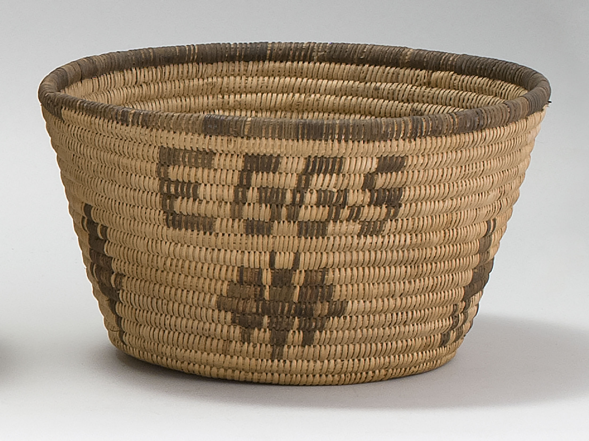 Appraisal: APACHE BASKET Circa In flared cylindrical form with figural and