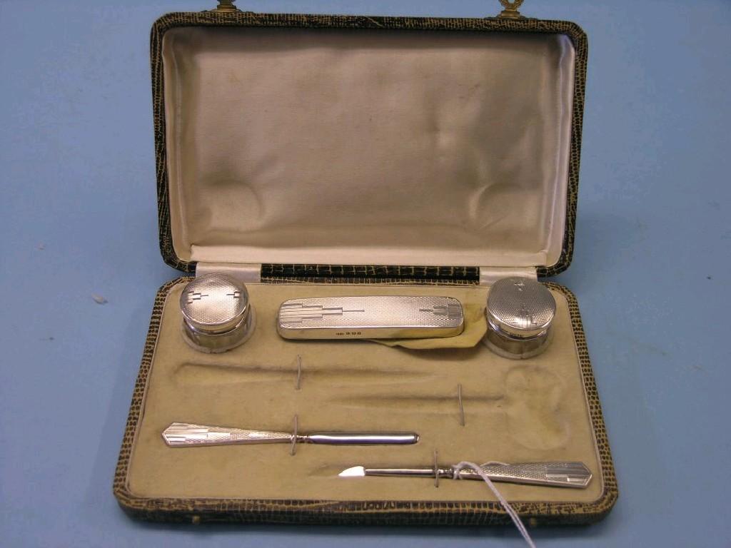 Appraisal: An Art Deco silver part vanity set five items with