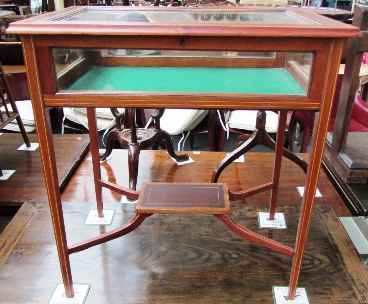 Appraisal: An early th century satinwood banded mahogany rectangular bijouterie table