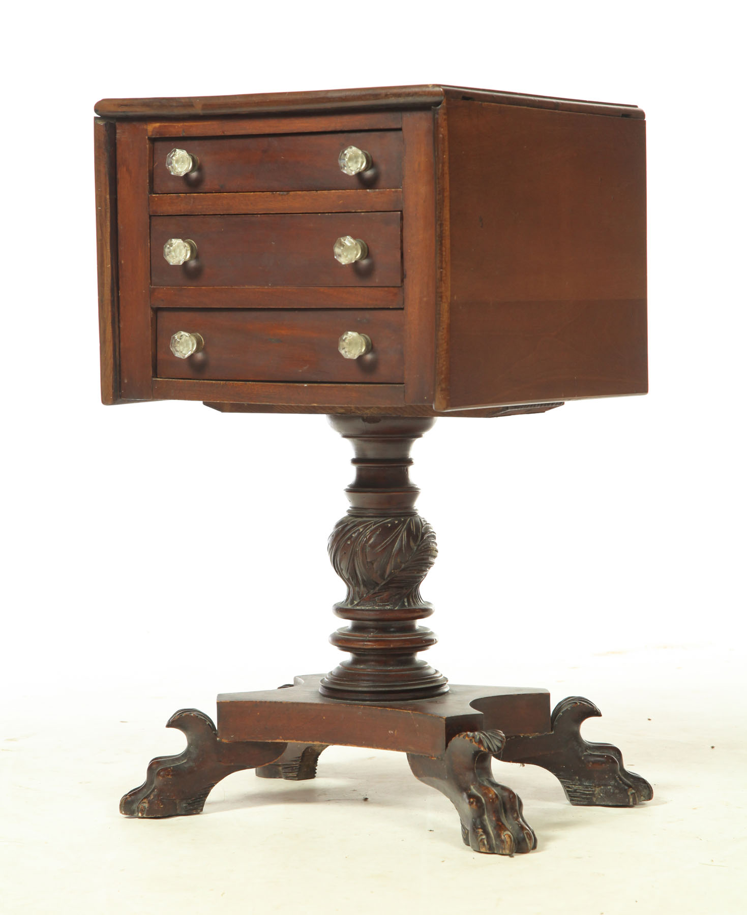 Appraisal: CLASSICAL SEWING STAND American nd quarter- th century mahogany Three