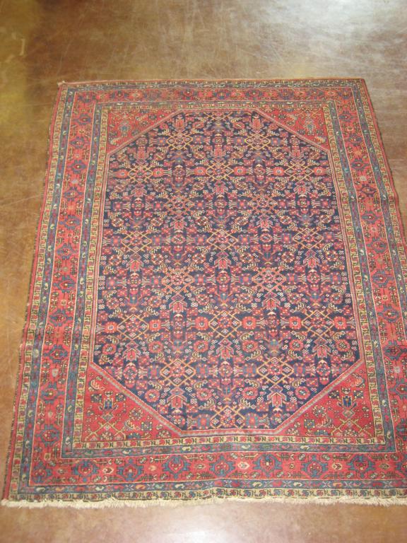 Appraisal: An old Tabriz bordered Rug with chamfered central medallion containing