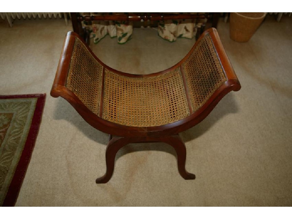 Appraisal: A REGENCY STYLE X -FRAME STOOL with a caned seat