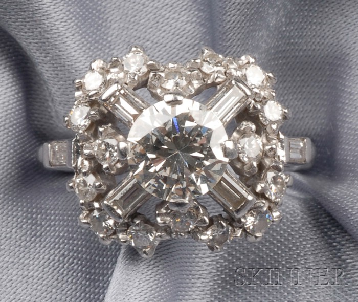 Appraisal: Platinum and Diamond Ring prong-set with a full-cut diamond weighing