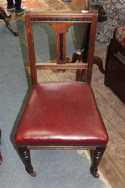 Appraisal: A SET OF TEN VICTORIAN AESTHETIC DINING CHAIRS by Lamb