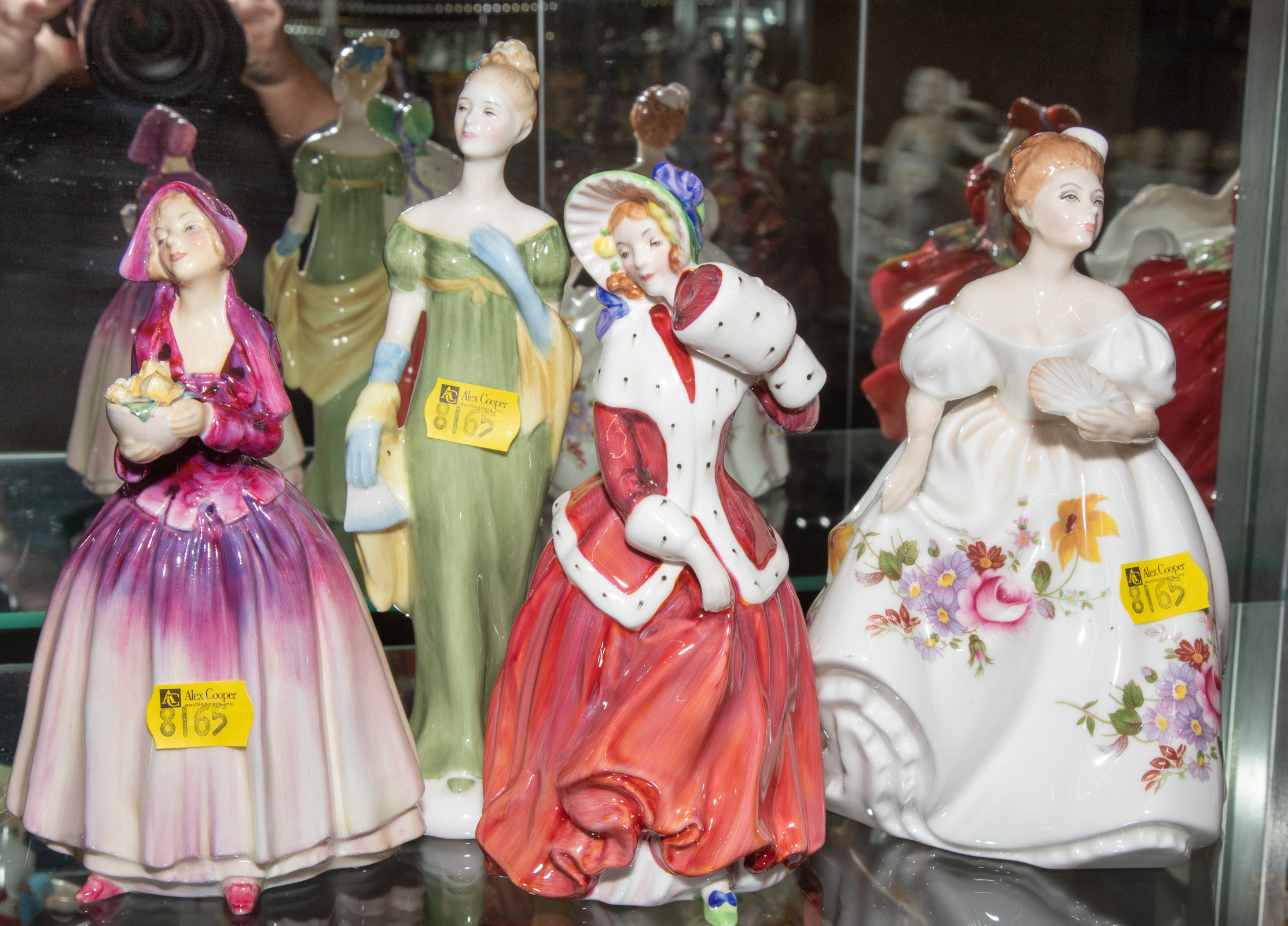 Appraisal: FOUR ROYAL DOULTON FIGURES Includes Marilyn Christmas Morn Dorcas and