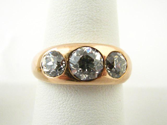 Appraisal: Men's K yellow gold three-stone diamond ring with approximately ct