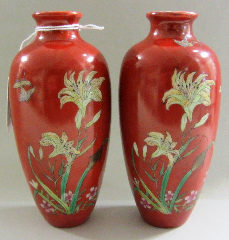 Appraisal: A pair of small Chinese porcelain slender ovoid vases Qianlong