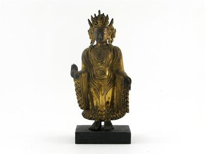 Appraisal: A Chinese gilt bronze figure of Buddha standing wearing flowing