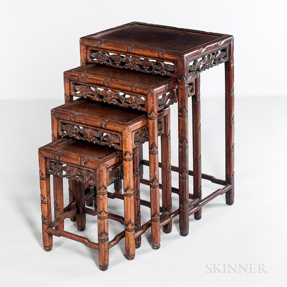 Appraisal: Four Carved Hardwood Nesting Tables Four Carved Hardwood Nesting Tables