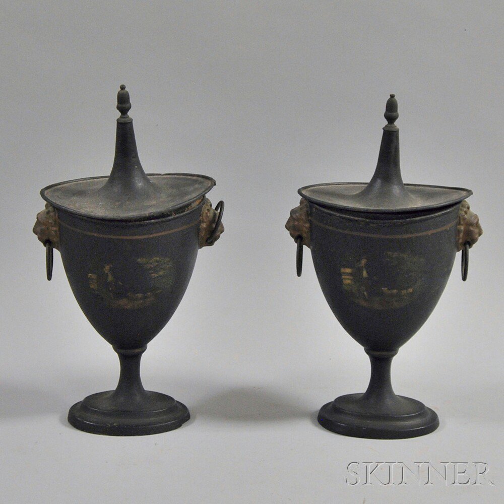 Appraisal: Pair of Tole Covered Chestnut Urns Europe th century the