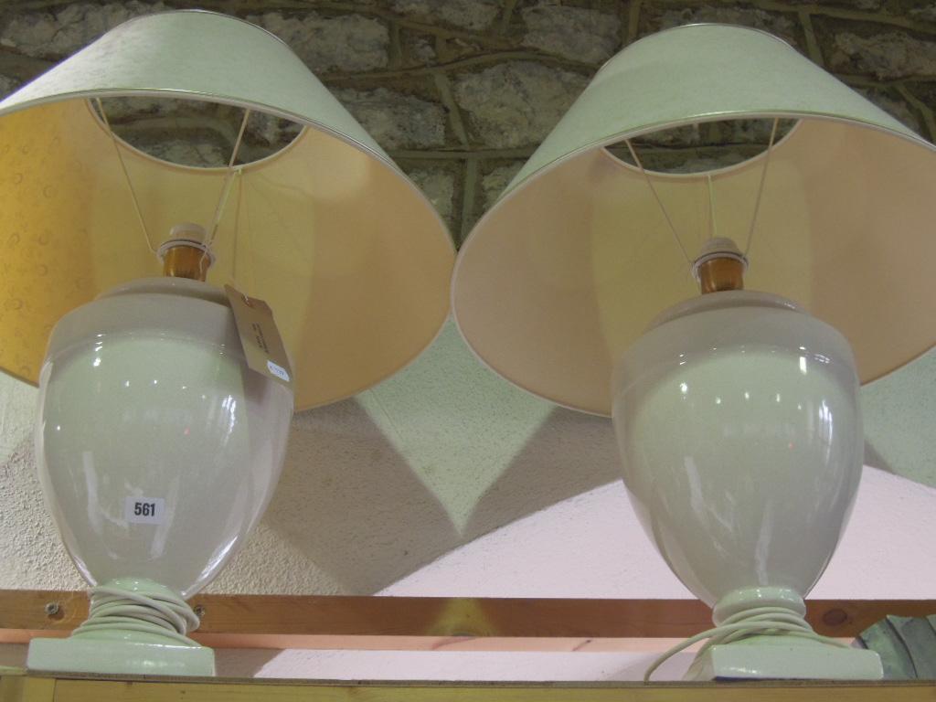 Appraisal: A pair of white crackle glazed table lamps of urn