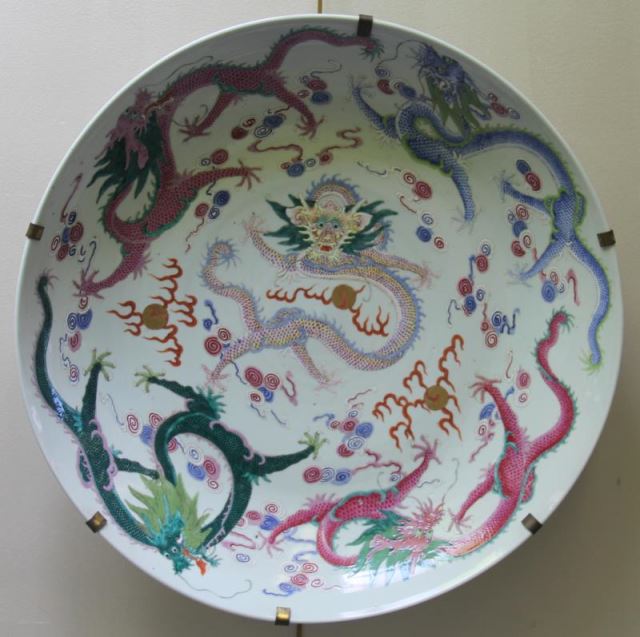 Appraisal: Impressive Antique Chinese Enamel DecoratedPorcelain Charger Finely decorated with dragons