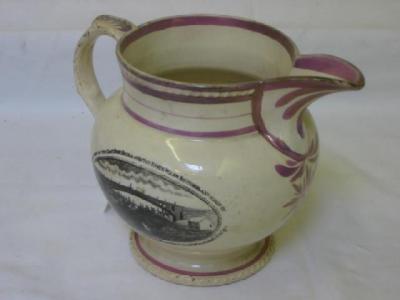 Appraisal: A SUNDERLAND PINK LUSTRE JUG of baluster form with gadrooned