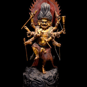 Appraisal: A Large Gilt and Red Lacquered Wood Figure of Mahakala