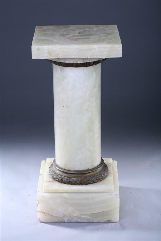 Appraisal: NEOCLASSICAL DORIC STYLE COLUMNAR ONYX PEDESTAL late th century with