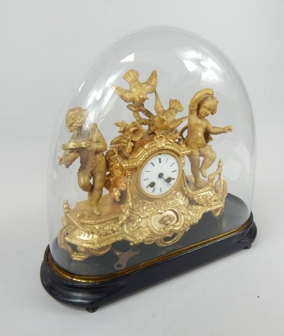 Appraisal: A late thC French gilt metal mantel clock the movement