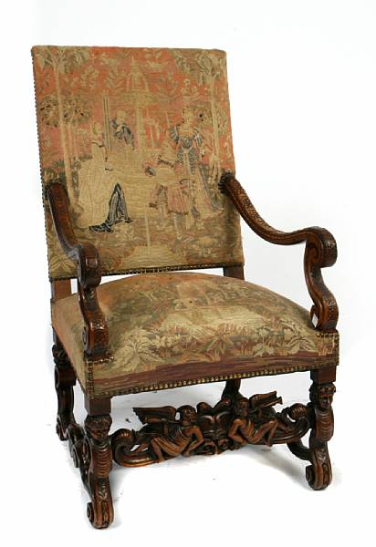 Appraisal: A Baroque style tapestry upholstered armchair height in