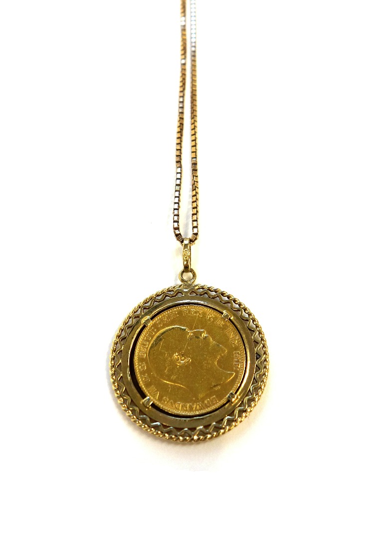 Appraisal: An Edward VII sovereign P in a gold pendant mount