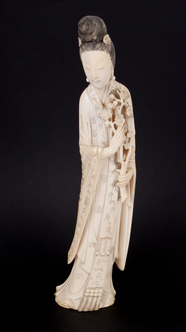 Appraisal: Chinese carved ivory Quan-Yin with ink highlights and signature underneath