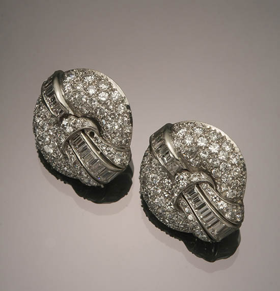 Appraisal: Pair of Platinum and Diamond Ear Clips Seaman Schepps Each