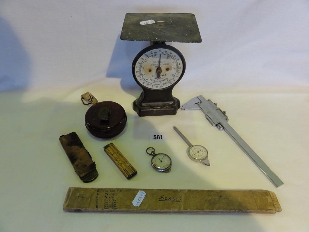 Appraisal: A miscellaneous collection of architects equipment including a tape measure