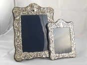 Appraisal: An ornate silver faced photo frame x cm and another