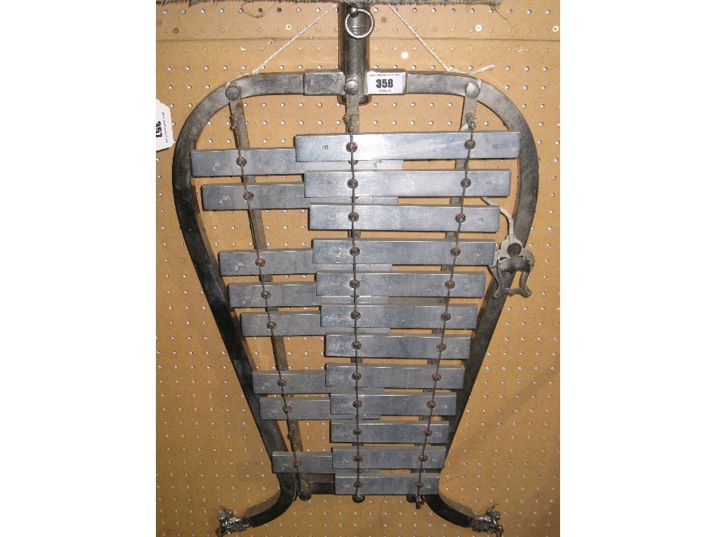 Appraisal: Marching glockenspiel harness and striker in store