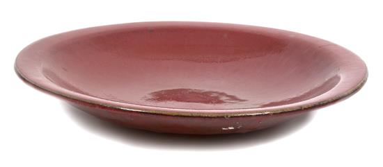 Appraisal: Sale Lot A Red Glazed Ceramic Charger th century Diameter