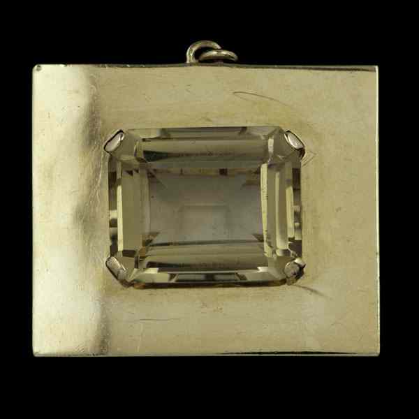 Appraisal: k Citrine Pendant k yellow gold pendant containing a rectangular