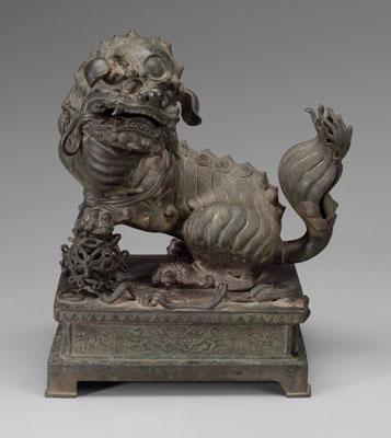 Appraisal: Chinese bronze Buddhist lion censer finely detailed beast playfully chewing