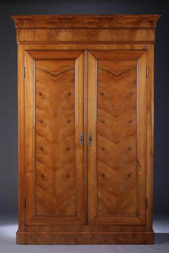 Appraisal: CHARLES X CHERRYWOOD ARMOIRE Flat cornice with ogee molding over