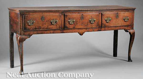 Appraisal: An English Carved Oak Dresser late th c rectangular molded