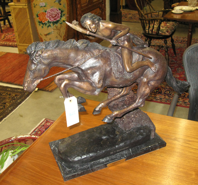 Appraisal: AFTER FREDERIC SACKRIDER REMINGTON American - Cheyenne patinated bronze sculpture