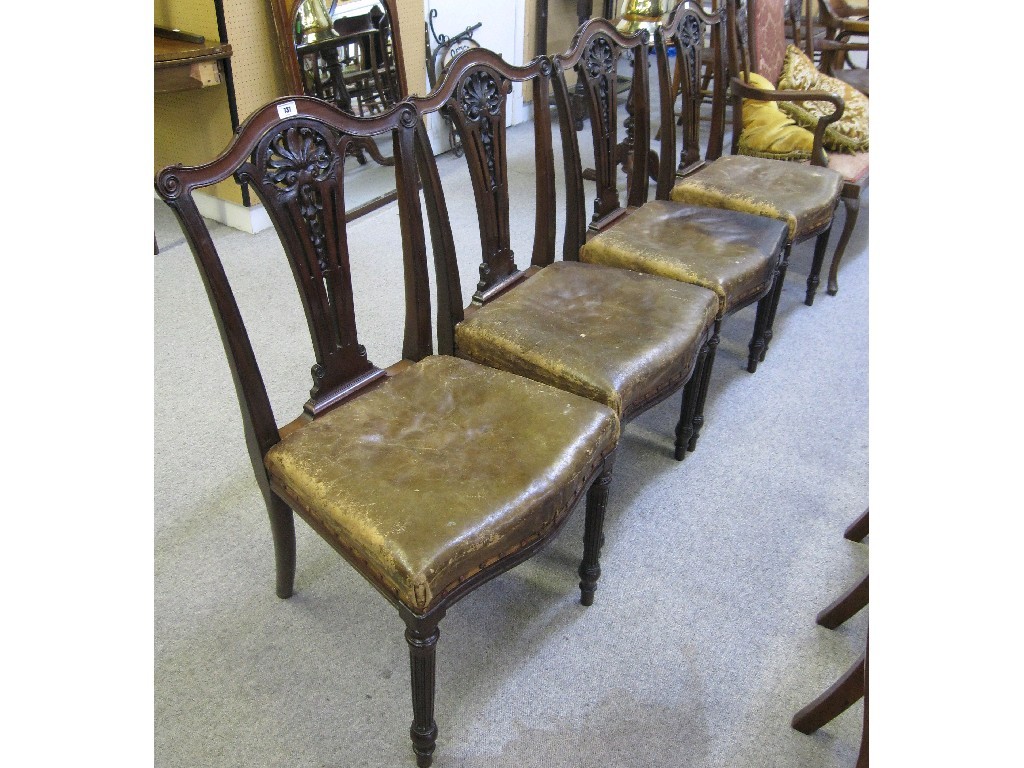 Appraisal: Set of four 's mahogany and leather upholstered dining chairs